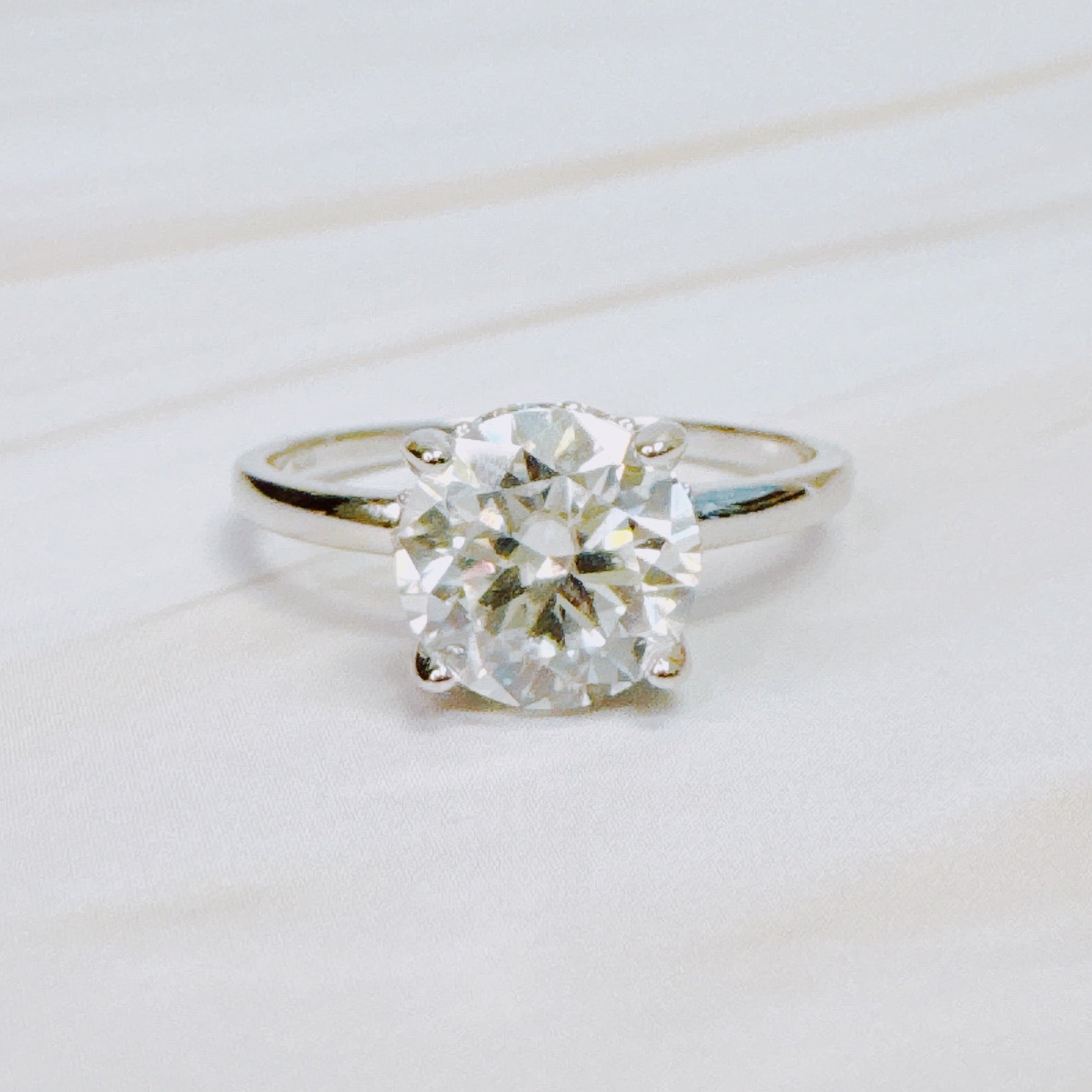Moissanite Radiance – White Gold Plated Sterling Silver 2CT Ring
